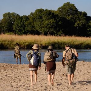 Robin Pope Mobile Walking Safari, crossing the Mupamadzi, best walking safari in Zambia